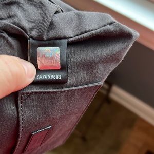 Fendi clutch with gold strap and black leather strap options